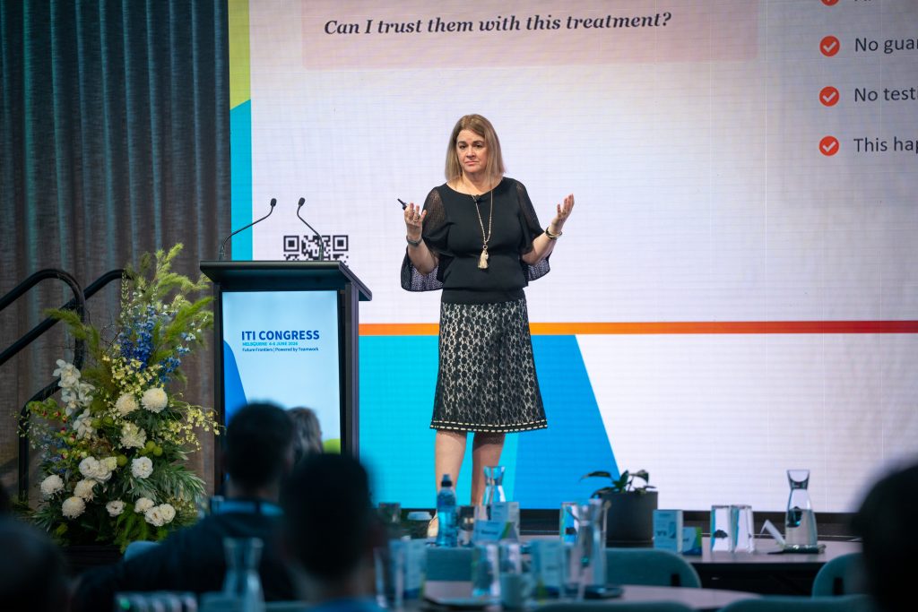 Carolyn S Dean speaking on AI and the patient journey at the ITI Congress Australasia 2026